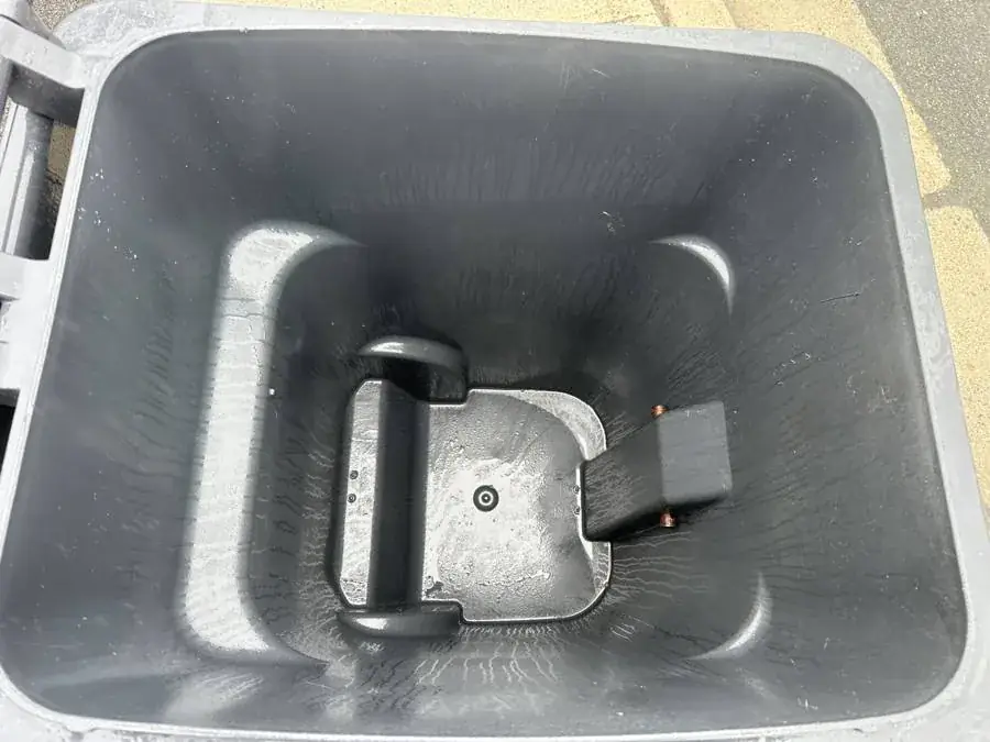 The same garbage bin after cleaning — spotless and fresh